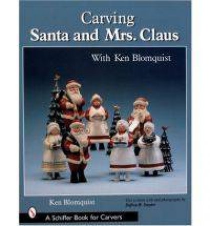 Carving Santa and Mrs. Claus by BLOMQUIST KEN