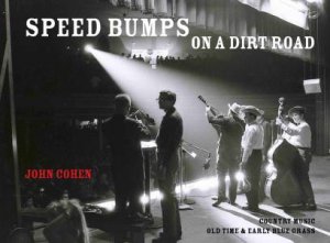 Speed Bumps on a Dirt Road by COHEN JOHN